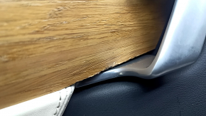 Tesla Model X 16-21 front left door panel, black and beige leather, light wood molding, tears and nicks in the leather, scratches, dents