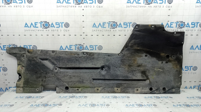 Right underbody protection for BMW 3 F30 4d 12-18 is worn, torn, and dented.