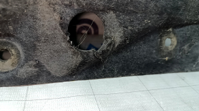 Right underbody protection for BMW 3 F30 4d 12-18 is worn, torn, and dented.