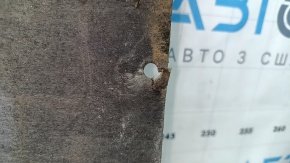 Right underbody protection for BMW 3 F30 4d 12-18 is worn, torn, and dented.