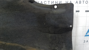 Right underbody protection for BMW 3 F30 4d 12-18 is worn, torn, and dented.