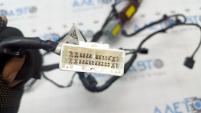 Tesla Model X 16-21 driver's seat wiring has a broken connector