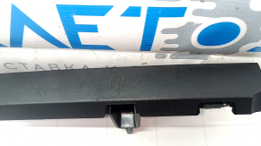 Tesla Model X 16-21 black driver's seat lower trim with scratches
