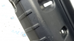 The trunk opening trim of the BMW 5 F10 11-16 is worn and scratched.