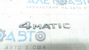 The emblem inscription 4MATIC on the trunk lid of the Mercedes C-class W205 19-21