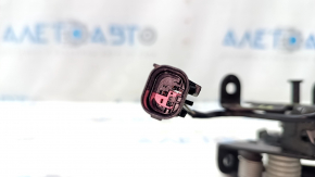 The left hood lock on a BMW 5 F10 11-16 has a broken connector.