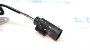 The left hood lock on a BMW 5 F10 11-16 has a broken connector.