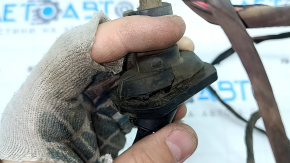 The wiring for the rear bumper of a BMW 5 F10 11-16 for parking sensors and a foot-operated trunk lid opening sensor is cut and the seal is torn.