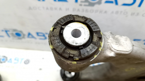 Tesla Model X 16-21 lower rear right control arm has a torn silent block.