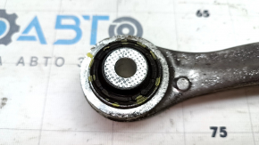 Tesla Model X 16-21 upper rear left front wishbone has a torn silent block.