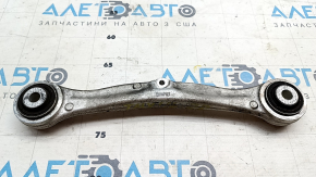 The upper rear right front control arm of a Tesla Model X 16-21 has a torn silent block.