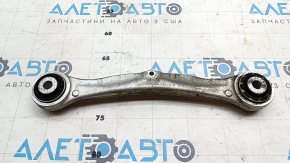 The upper rear right front control arm of a Tesla Model X 16-21 has a torn silent block.