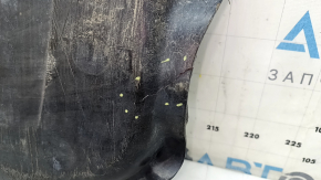 The front engine guard of the Mercedes C-class W205 15-21 AWD is worn and has cracks.