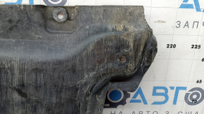 The front engine guard of the Mercedes C-class W205 15-21 AWD is worn and has cracks.