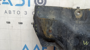 The front engine guard of the Mercedes C-class W205 15-21 AWD is worn and has cracks.