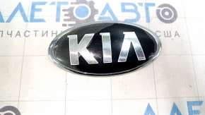 The KIA emblem badge on the front bumper of the Kia Niro 17-22 has swollen paint and sand.