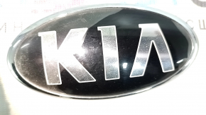 The KIA emblem badge on the front bumper of the Kia Niro 17-22 has swollen paint and sand.