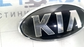 The KIA emblem badge on the front bumper of the Kia Niro 17-22 has swollen paint and sand.
