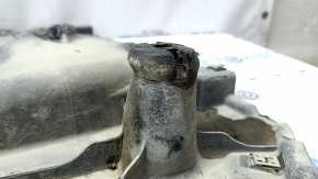 Left underbody protection for VW Atlas 18-25 is dented and torn.