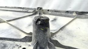 Left underbody protection for VW Atlas 18-25 is dented and torn.
