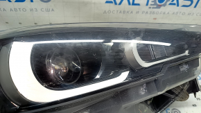 Mazda CX-5 22-25 right front headlight is worn and sandy