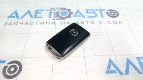 Mazda CX-5 20-24 keyless entry key, 4 buttons, type 2, scratches, worn, chrome chipped