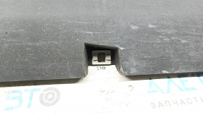 The left side sill of a Lincoln MKC 15-19 is dented, scuffed, scratched, has damaged fasteners, and is torn.