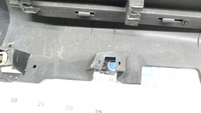 The left side sill of a Lincoln MKC 15-19 is dented, scuffed, scratched, has damaged fasteners, and is torn.