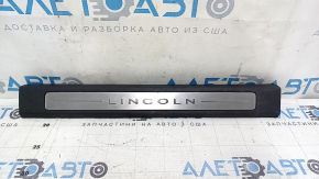 Lincoln MKC 15-19 front right door sill plate, black, non-illuminated, scratches