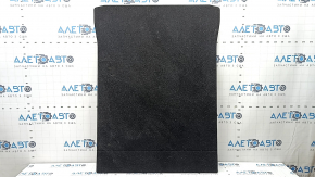 The trunk floor of a BMW 5 G30 17-23 is black and dented.
