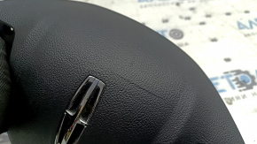 The Lincoln MKC 15-19 driver's steering wheel airbag is black, with the airbag outline visible.