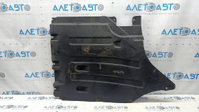 The rear left underbody protection of the BMW X3 G01 18-21 is torn and dented.