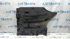 The rear left underbody protection of the BMW X3 G01 18-21 is torn and dented.