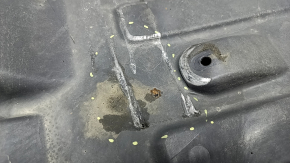 The rear left underbody protection of the BMW X3 G01 18-21 is torn and dented.