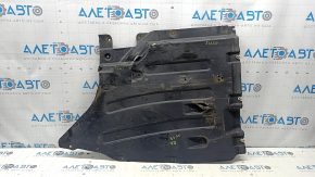 The rear right underbody protection of the BMW X3 G01 18-21 is torn, dented, missing a fragment