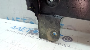 The rear right underbody protection of the BMW X3 G01 18-21 is torn, dented, missing a fragment
