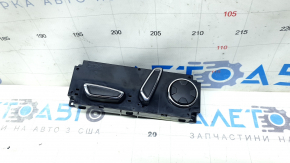Lincoln MKC 15-19 passenger seat control with black and chrome buttons