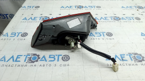 Left inner trunk lid light for Toyota Avalon 13-15, housing crack, missing glass fragment