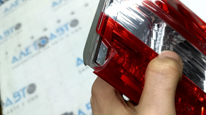 Left inner trunk lid light for Toyota Avalon 13-15, housing crack, missing glass fragment