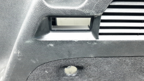 Right arch trim for a 1917-19 Lincoln MKC, black, with scuffs and scratches.