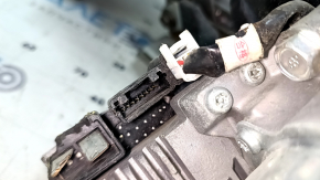 The electric power steering column of a Mazda 6 14-17 USA has broken mounts and broken connectors.