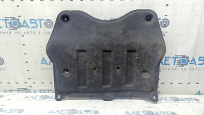 The rear engine guard of a Lincoln MKC 15-19 is worn, dented, and the fastener is torn.