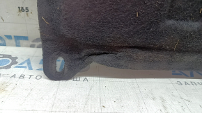 The rear engine guard of a Lincoln MKC 15-19 is worn, dented, and the fastener is torn.