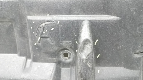 The left engine guard for a Toyota Avalon 13-15 is worn and dented.