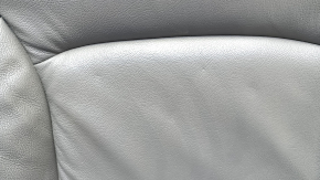 Chevrolet Malibu 16-25 passenger seat back upholstery, gray leather, wrinkled, tears