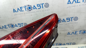 Right inner trunk lid light for VW Passat b8 16-19 USA, dark, scratches, glued on
