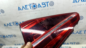 Right inner trunk lid light for VW Passat b8 16-19 USA, dark, scratches, glued on