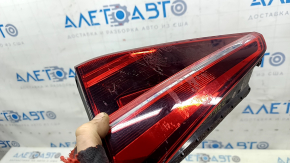 Right inner trunk lid light for VW Passat b8 16-19 USA, dark, scratches, glued on