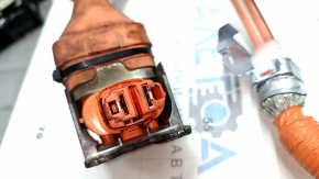 The high-voltage cable running through the entire body of a Toyota Camry v70 18-24 hybrid has been cut.