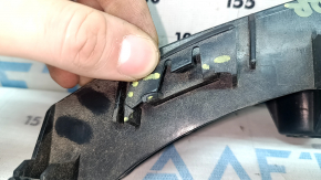 The right rear bumper mount under the light of the Lexus ES300h ES350 13-18 is cracked.